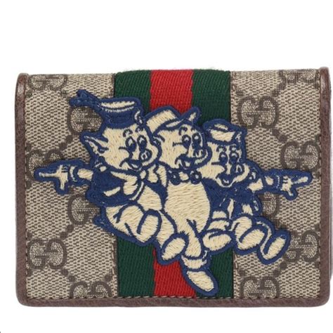 three little pigs gucci wallet|Gucci flying pig sweatshirt.